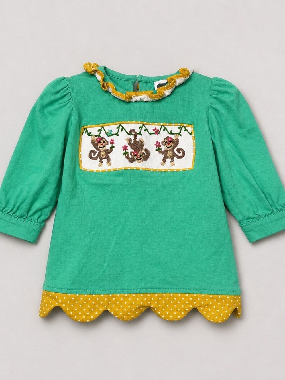True Hand green and musty smocked and monkey embroidered long sleeve dress